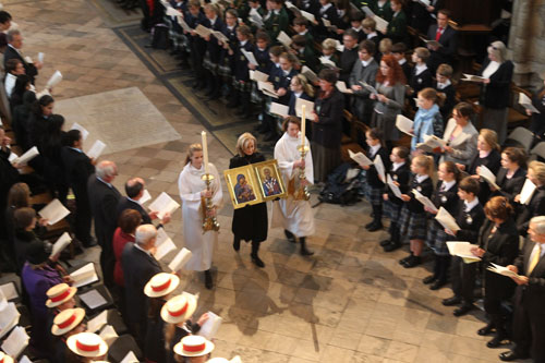 The Woodard Diptych icon is carried through the Abbey